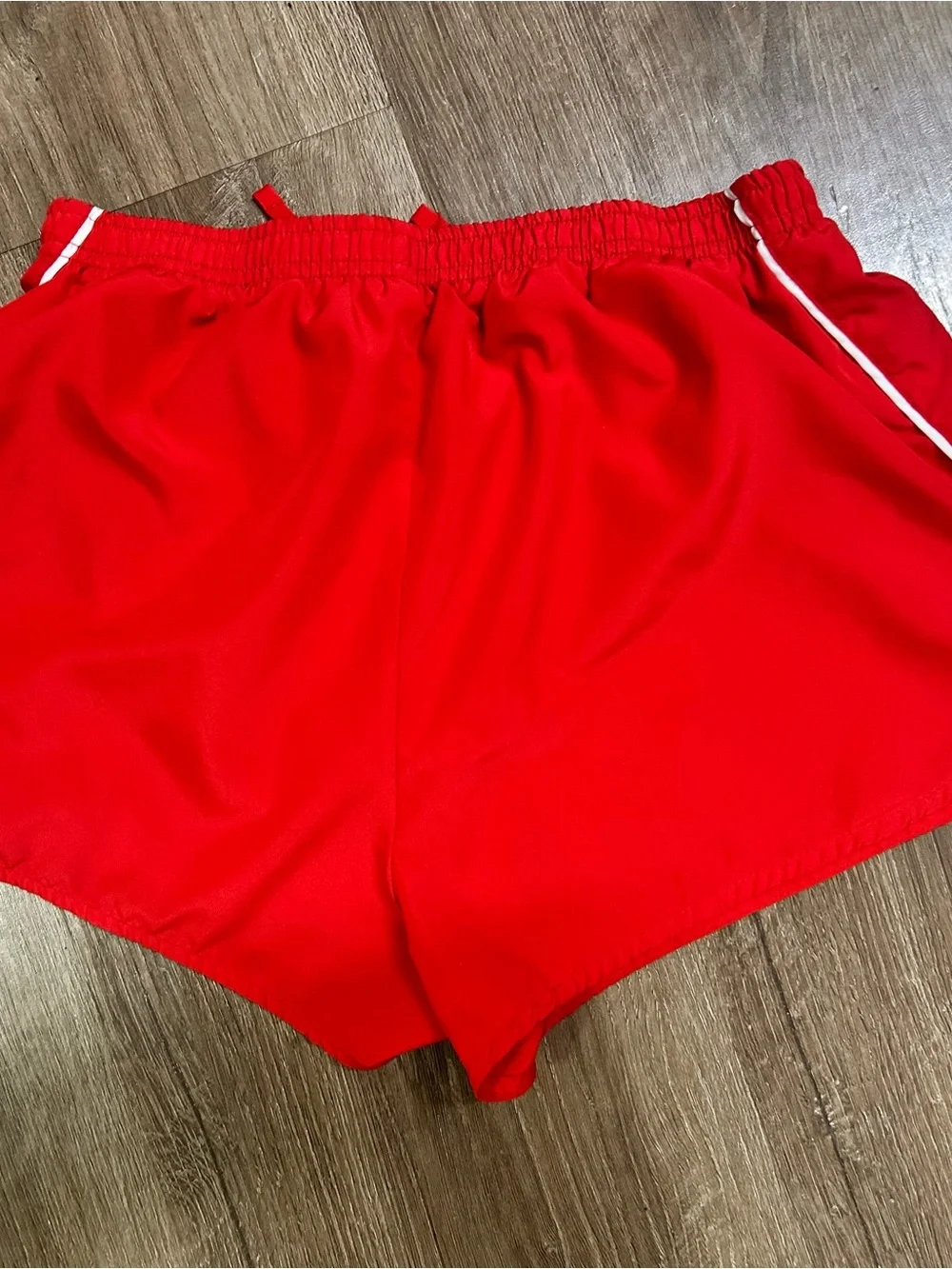 Nike girls Red Running Shorts with White Swoosh